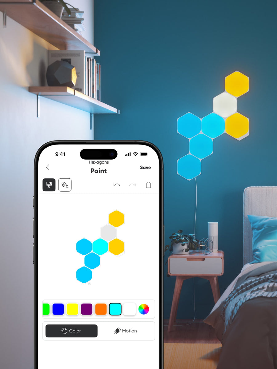 A smartphone screen shows an app interface for configuring hexagon wall lights, while in the bedroom setting a cluster of glowing hexagon wall lights is mounted on a blue wall above a bed.